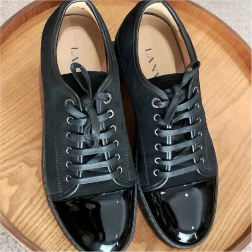 A refined all-black sneaker that combines luxurious suede craftsmanship with contemporary everyday style.